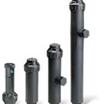 Four black cylindrical water filter cartridges of varying sizes arranged in ascending order.